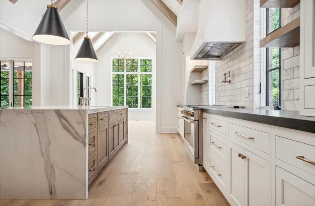 Wide plank white oak flooring in kitchen Charlotte hardwood floor trends in 2026