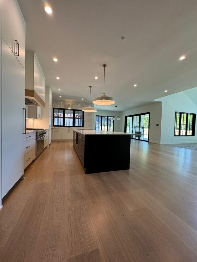 Hardwood flooring installation in kitchen Charlotte Fabricio Hardwood Floors