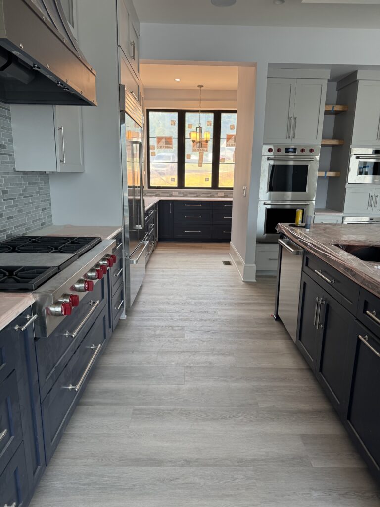 high quality vinyl flooring installed in kitchen in Charlotte by Fabricio Hardwood Floors