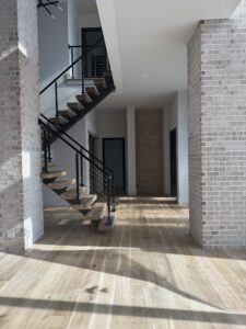 hardwood floors installed by staircase in Charlotte