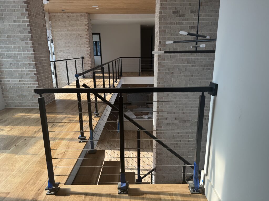 beautiful hardwood floor installed in luxury home on second floor Fabricio Hardwood Floors