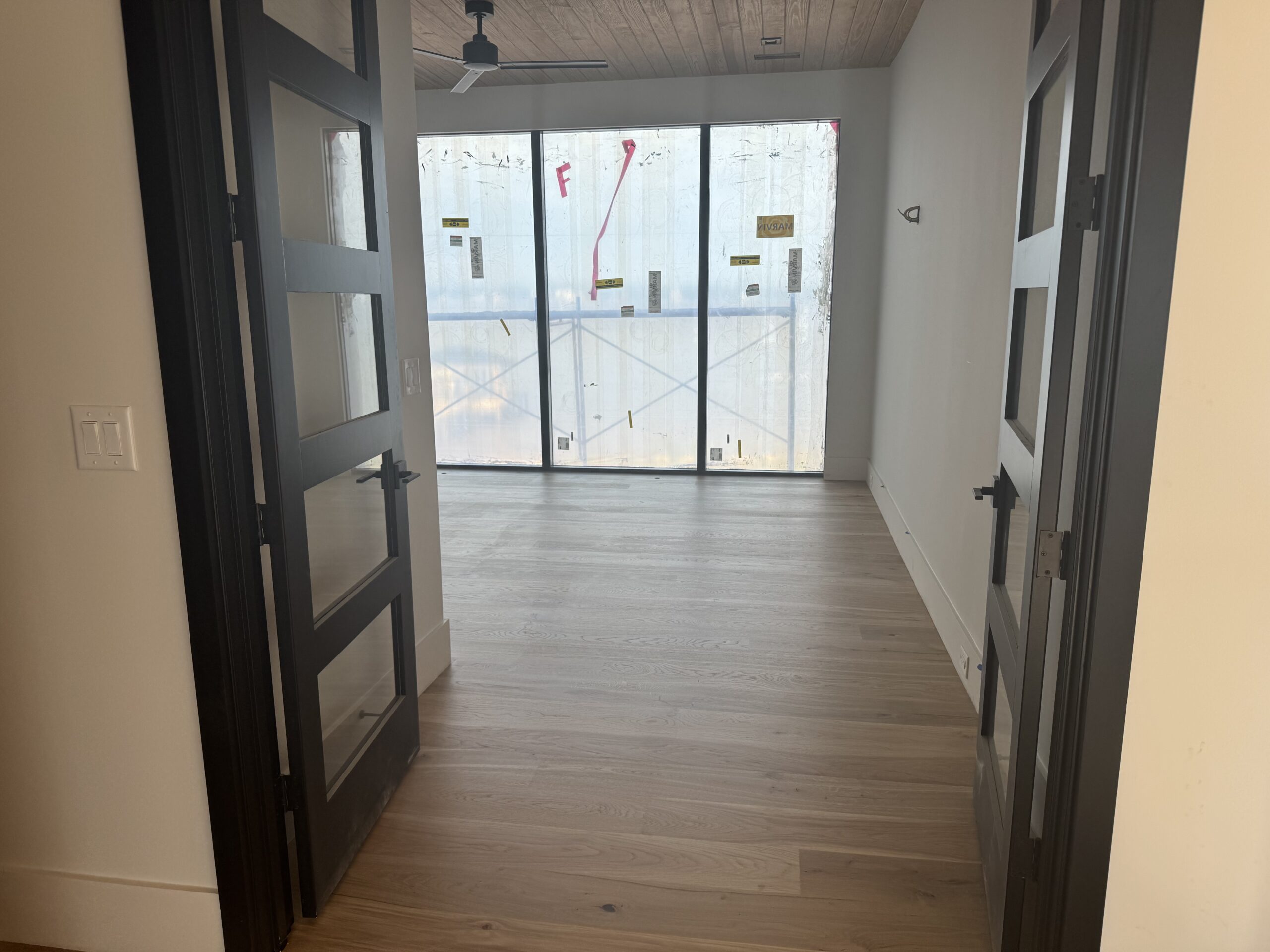 hardwood floors installed in bedroom by Fabricio Hardwood Floors