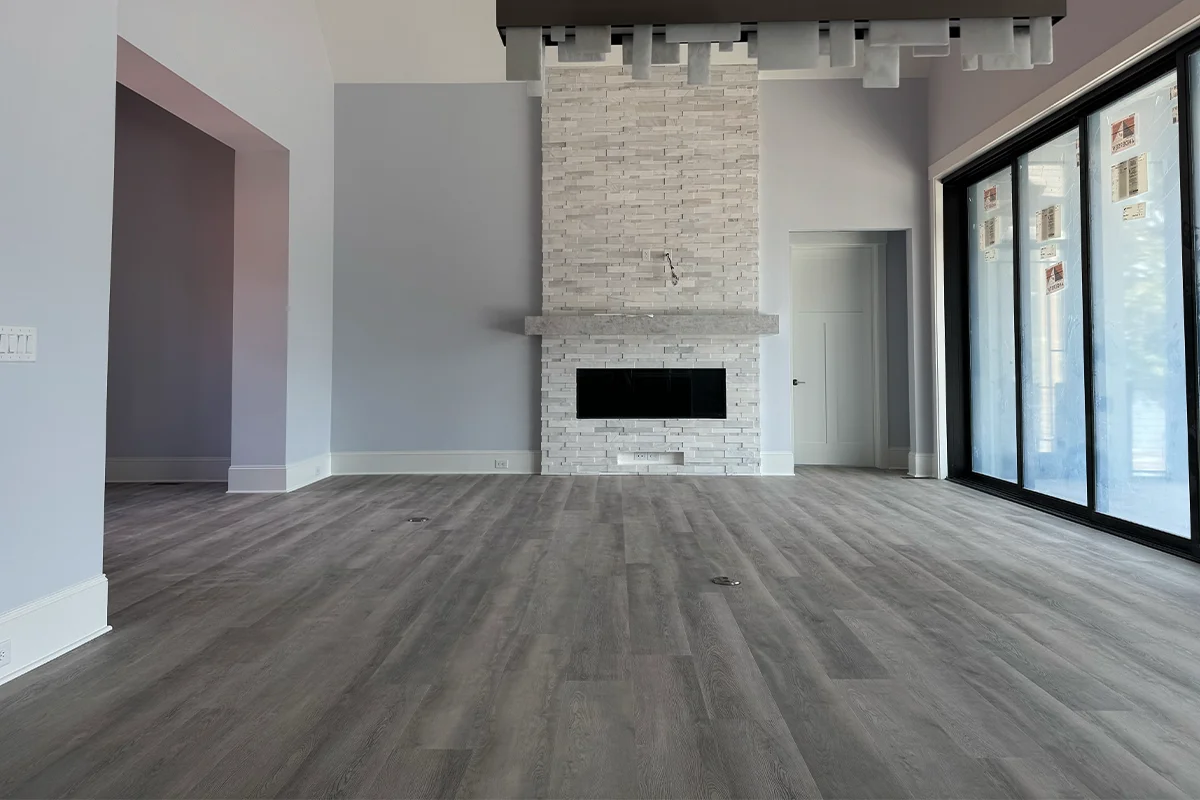 LVP flooring installed in living room Charlotte Fabricio Hardwood Floors